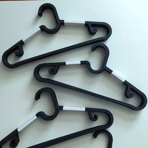 Set of 40 Ikea black plastic closet hangers